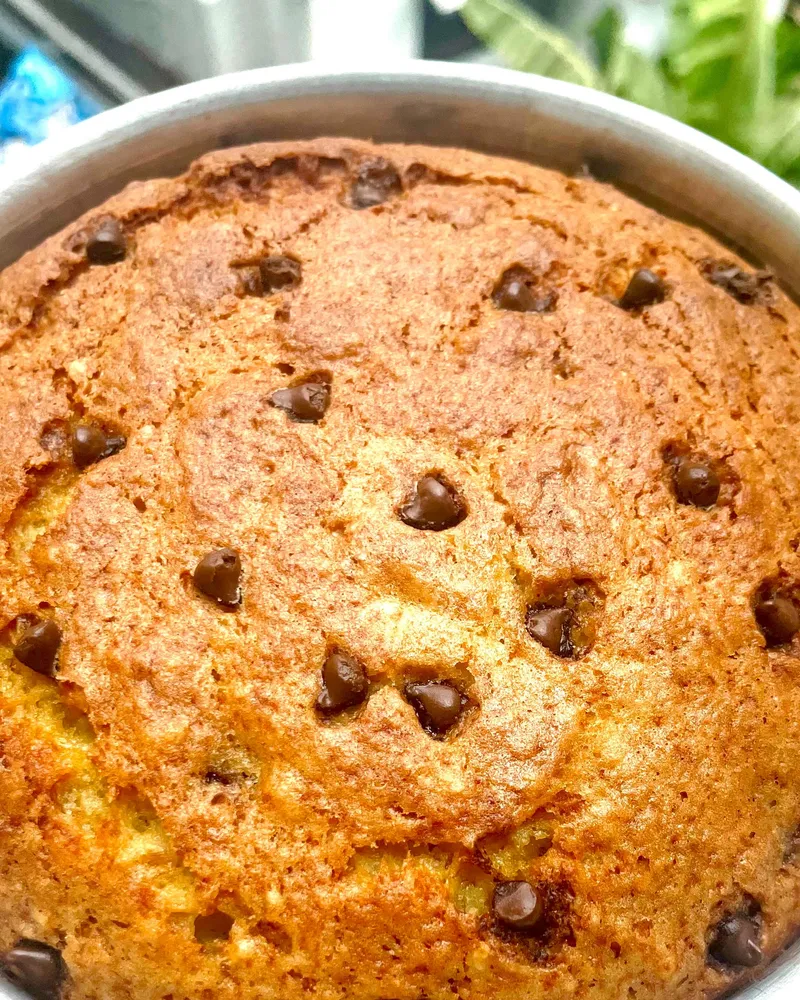 Banana walnut choco chunk cake in its tin